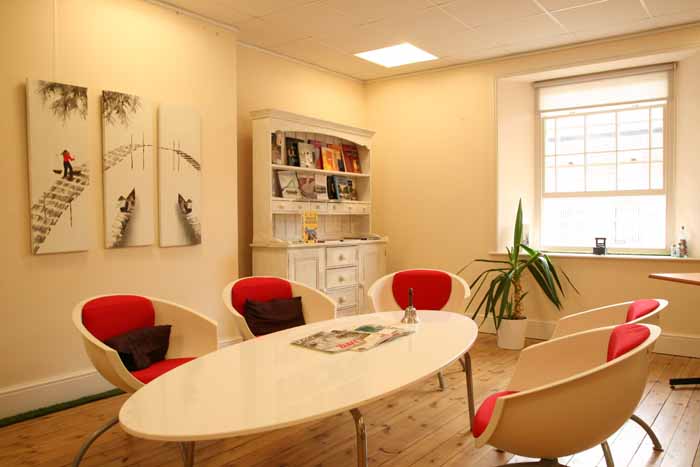 Light-filled Sefton room with seating around a meeting table